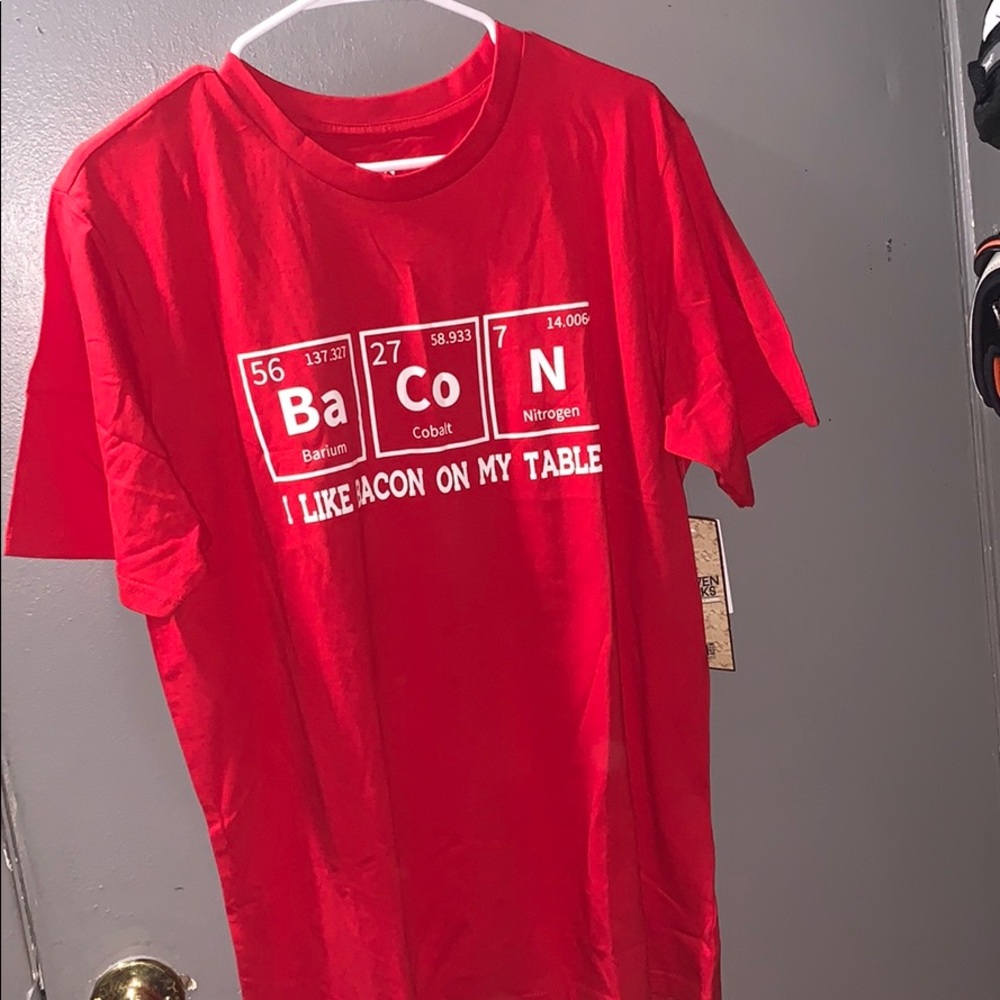 Brand new men’s size large T-shirt.